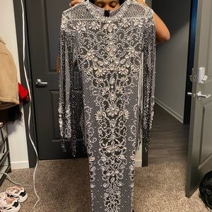 Mesh dress with rhinestones.